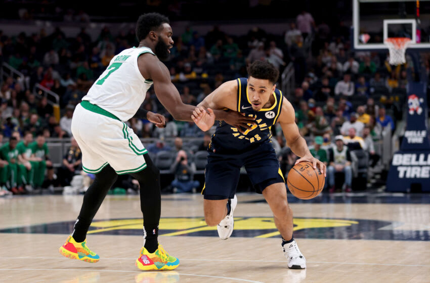 Malcolm Brogdon #7 of the Indiana Pacers drives against Jaylen Brown #7 of the Boston Celtics (Photo by Dylan Buell/Getty Images)