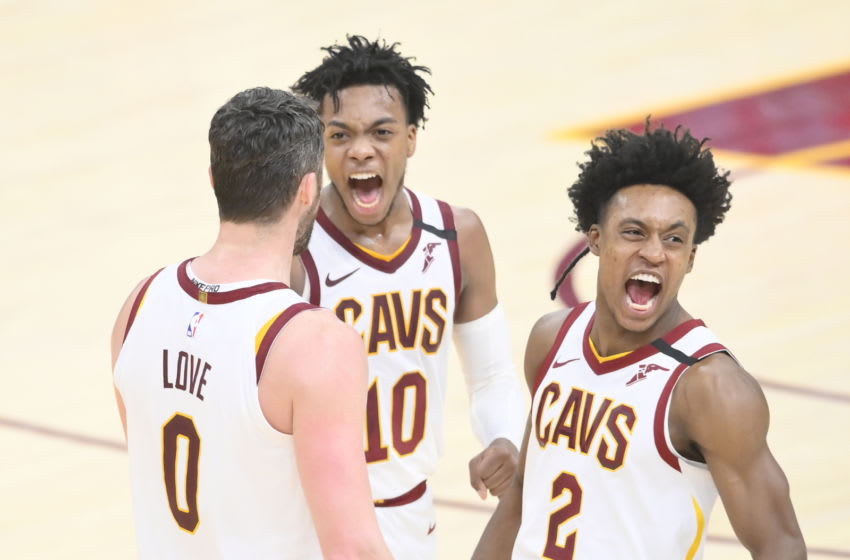 Feb 24, 2020; Cleveland, Ohio, USA; Cleveland Cavaliers forward Kevin Love (0) celebrates his basket with guard Darius Garland (10) and guard Collin Sexton (2) in overtime against the Miami Heat at Rocket Mortgage FieldHouse. Mandatory Credit: David Richard-USA TODAY Sports